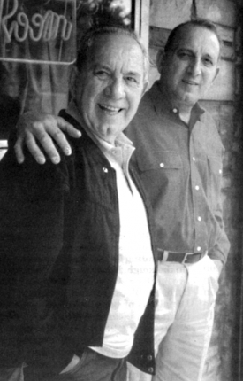 Sonny Elia: The elder restauranteur, left, was shown with his son Richard outside his restaurant in Adams Corner in 1999. Photo by Bill Forry